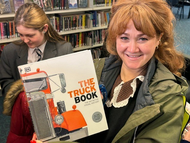 World Book Day teacher with truck book