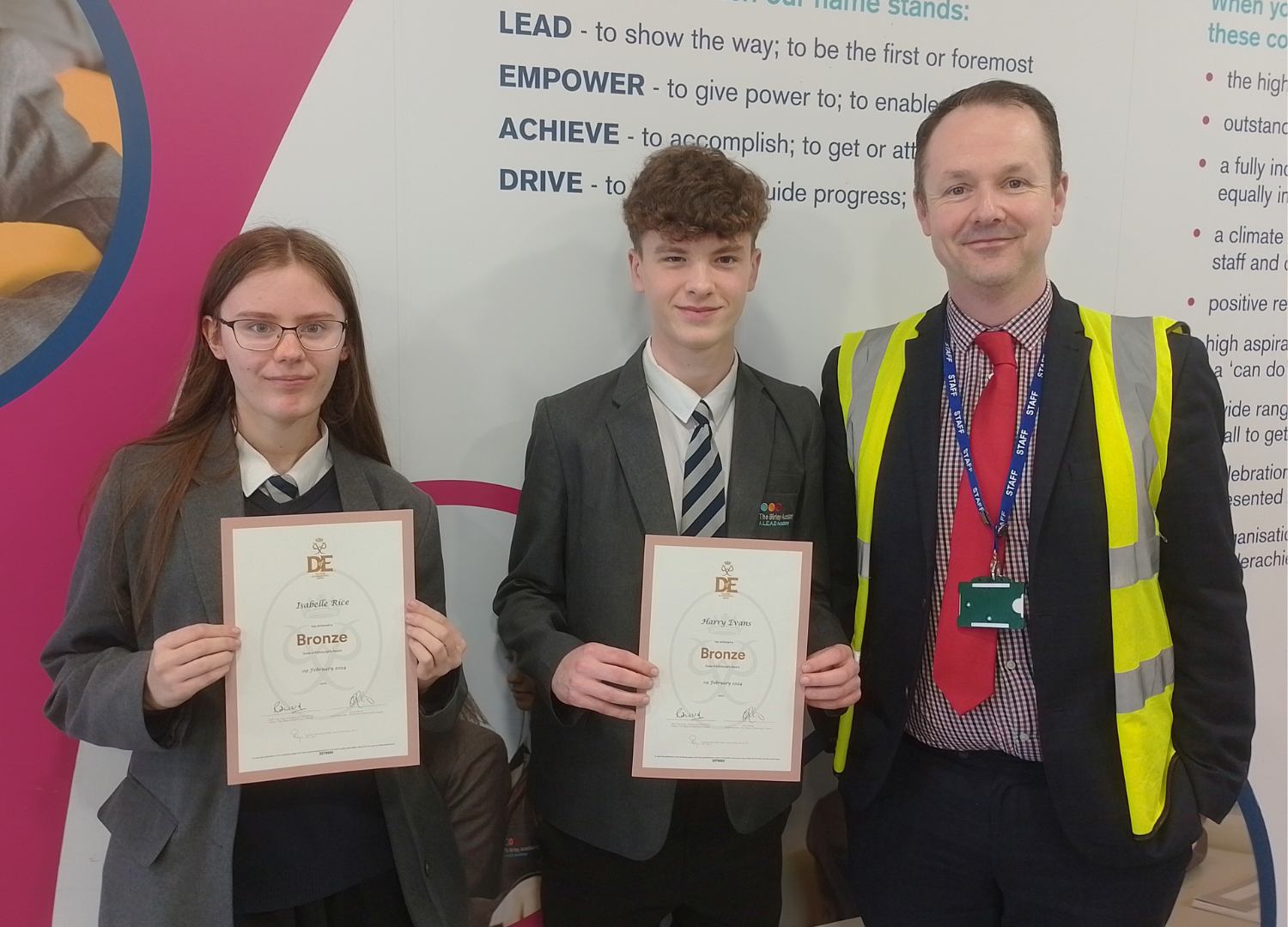 Pupils from the Birley Academy receive their Bronze Duke of Edinburgh awards from Mr Casey, Interim Headteacher
